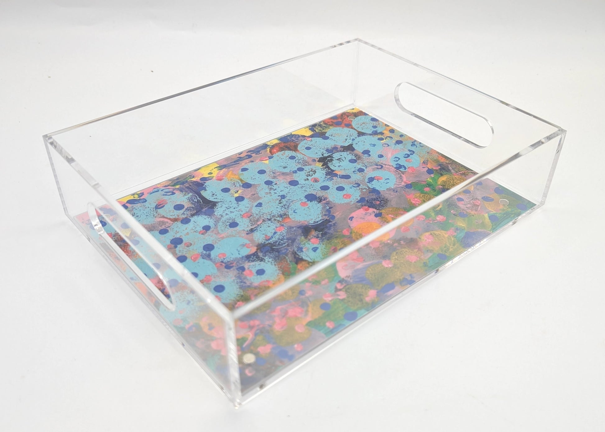 acrylic tray with a colorful design with dots