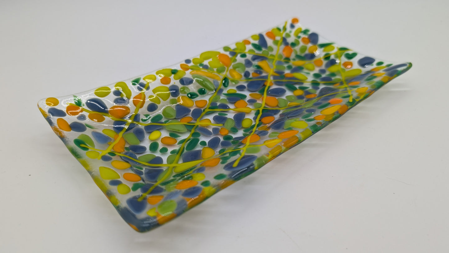 glass tray with dots of yellow, green, blue and orange
