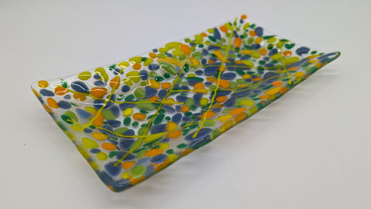 glass tray with dots of yellow, green, blue and orange