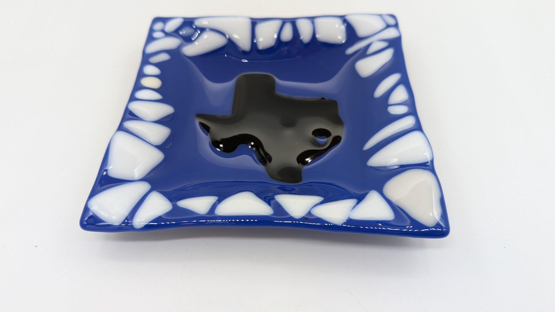 blue glass plate with texas shape