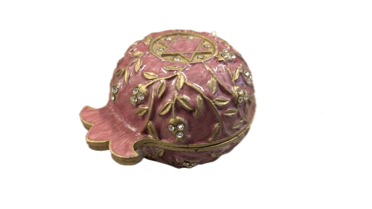 Closed candle holder in pomegranate shape
