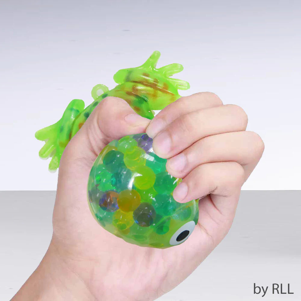 A green squishy ball frog