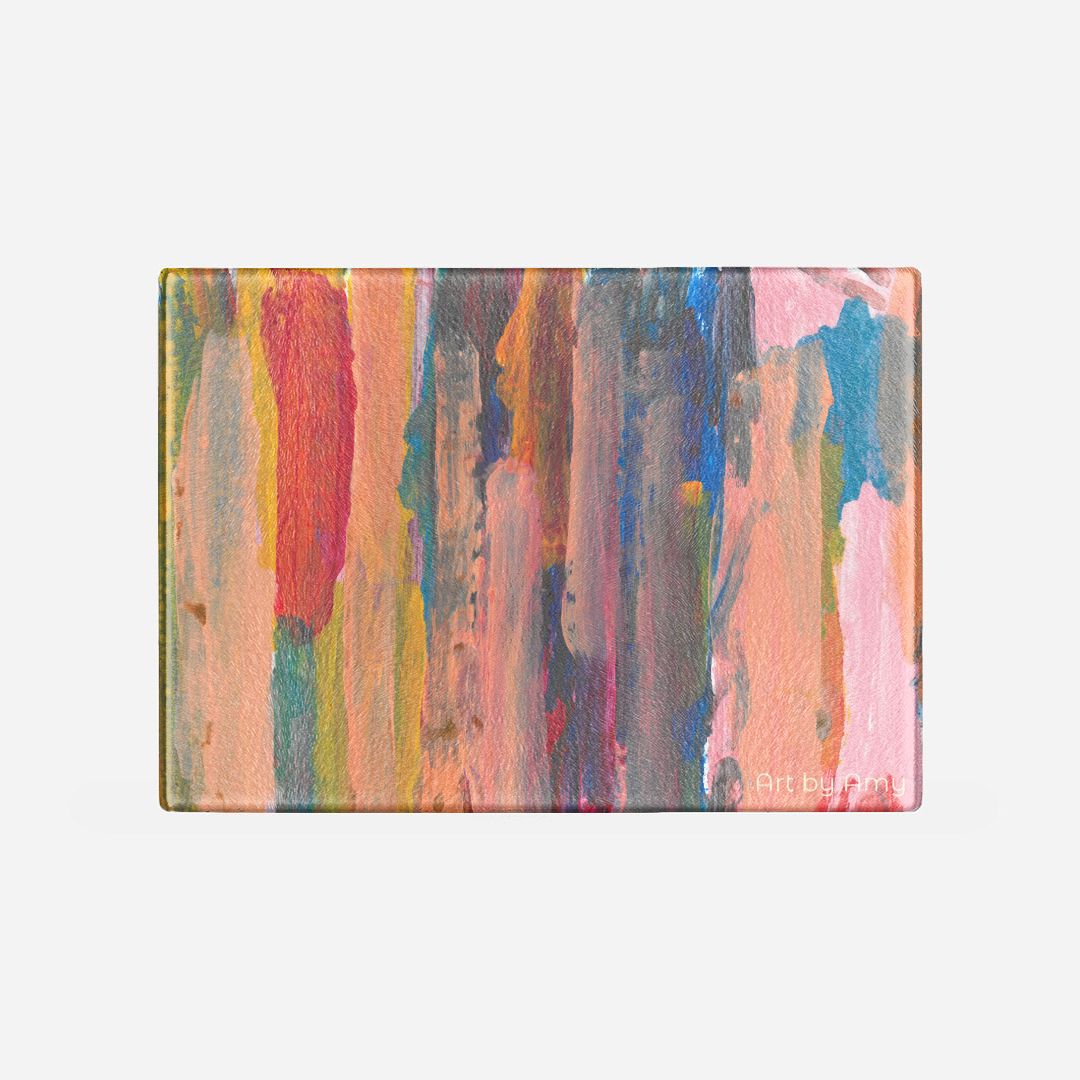 cutting board with Layers of vertical brushstrokes overlapping. In the center the background is a dark blue, to the left is yellow, and the right is pink. The top layer of brushstrokes are mostly a pale pink