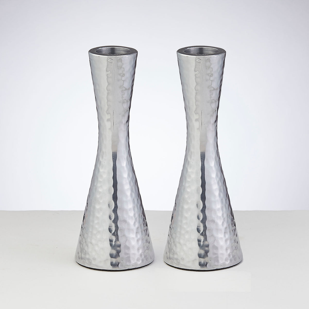 candle sticks with hammered metal