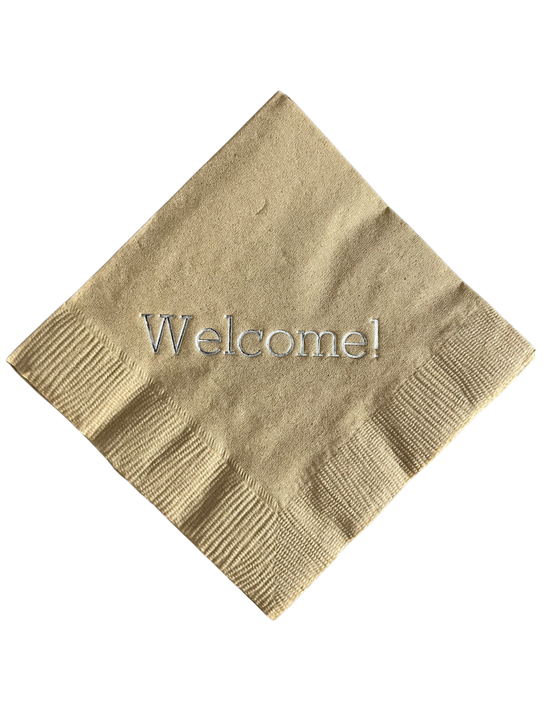 gold welcome napkin
