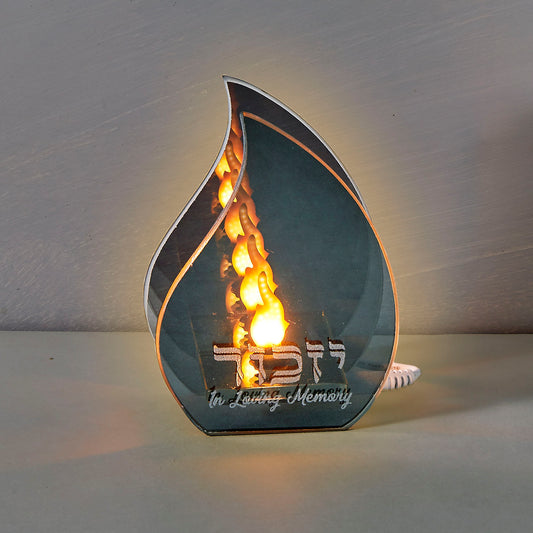 image of electric candle that is in the shape of a flame