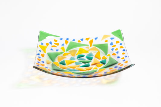 clear glass bowl with transparent green, yellow and blues