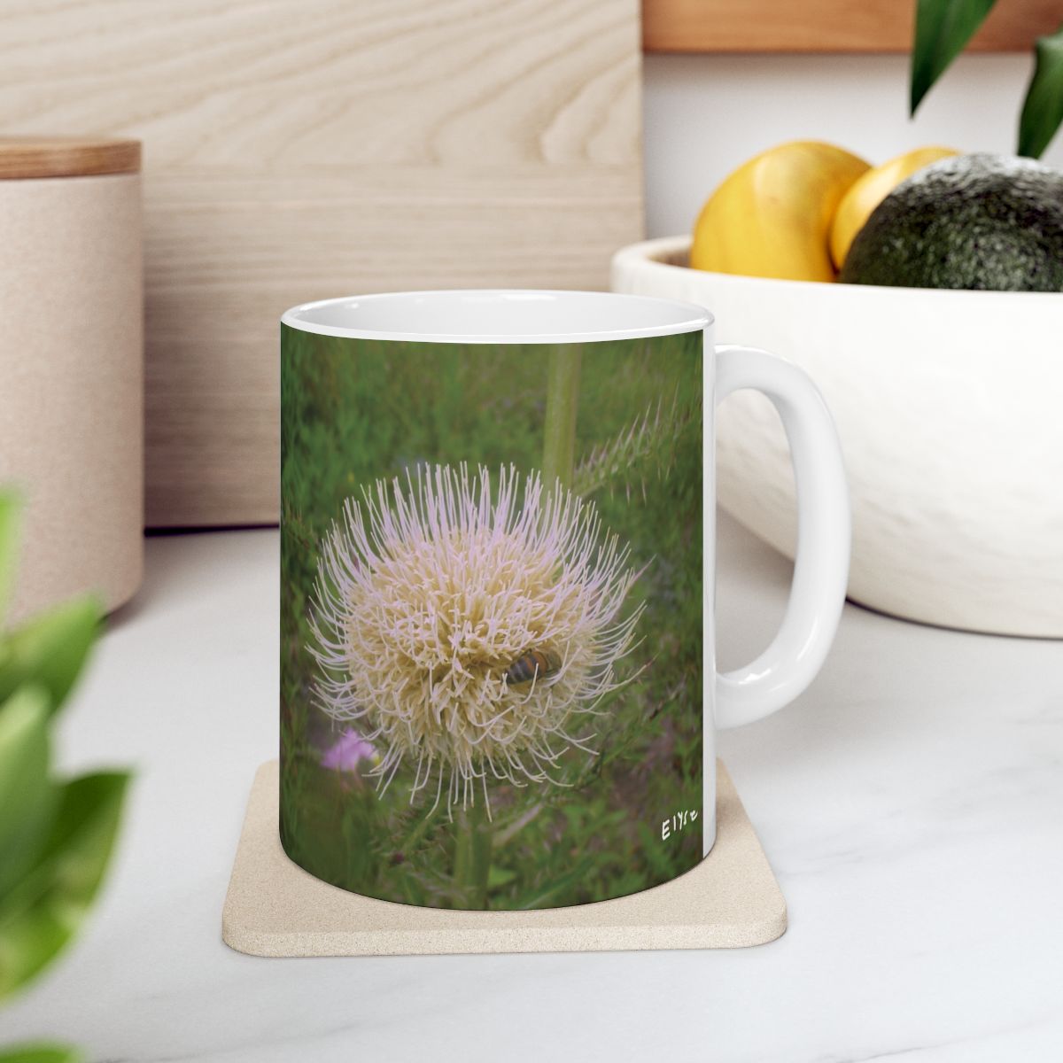 mug of a Photograph of White Spikey Flower with a Bee inside it