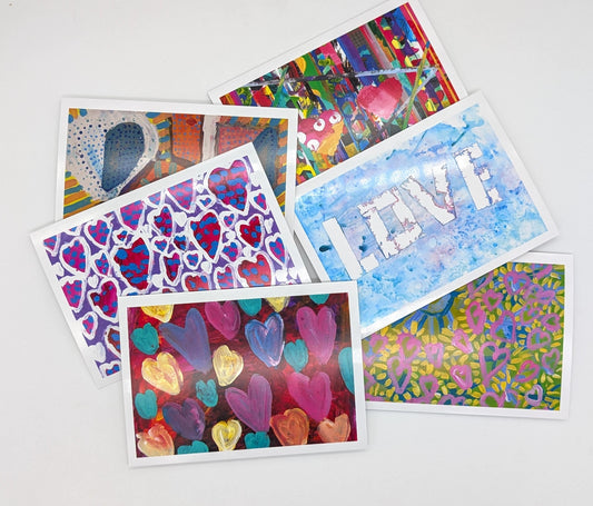package of 6 greeting cards with various images of hearts