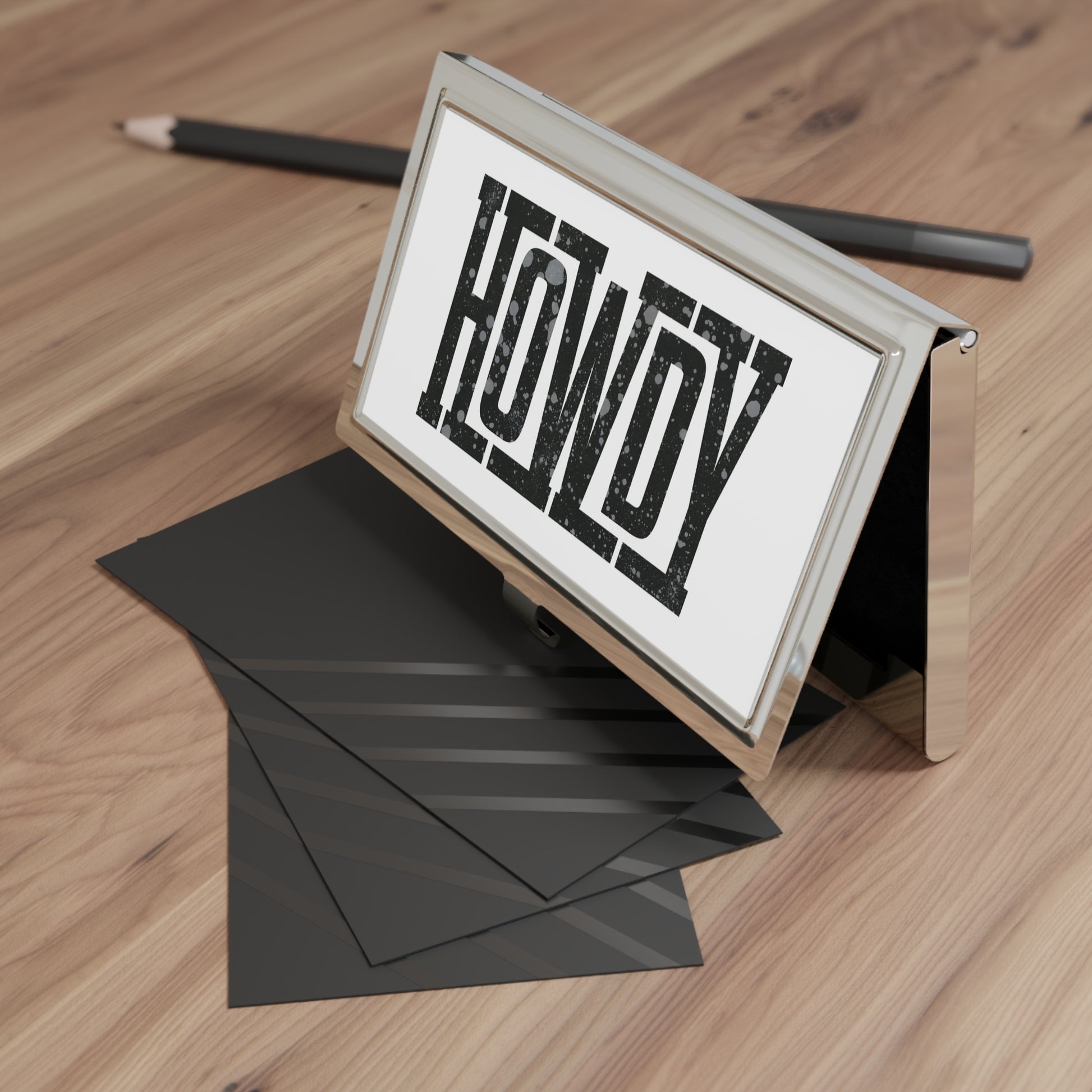 metal business card holder of "Howdy"