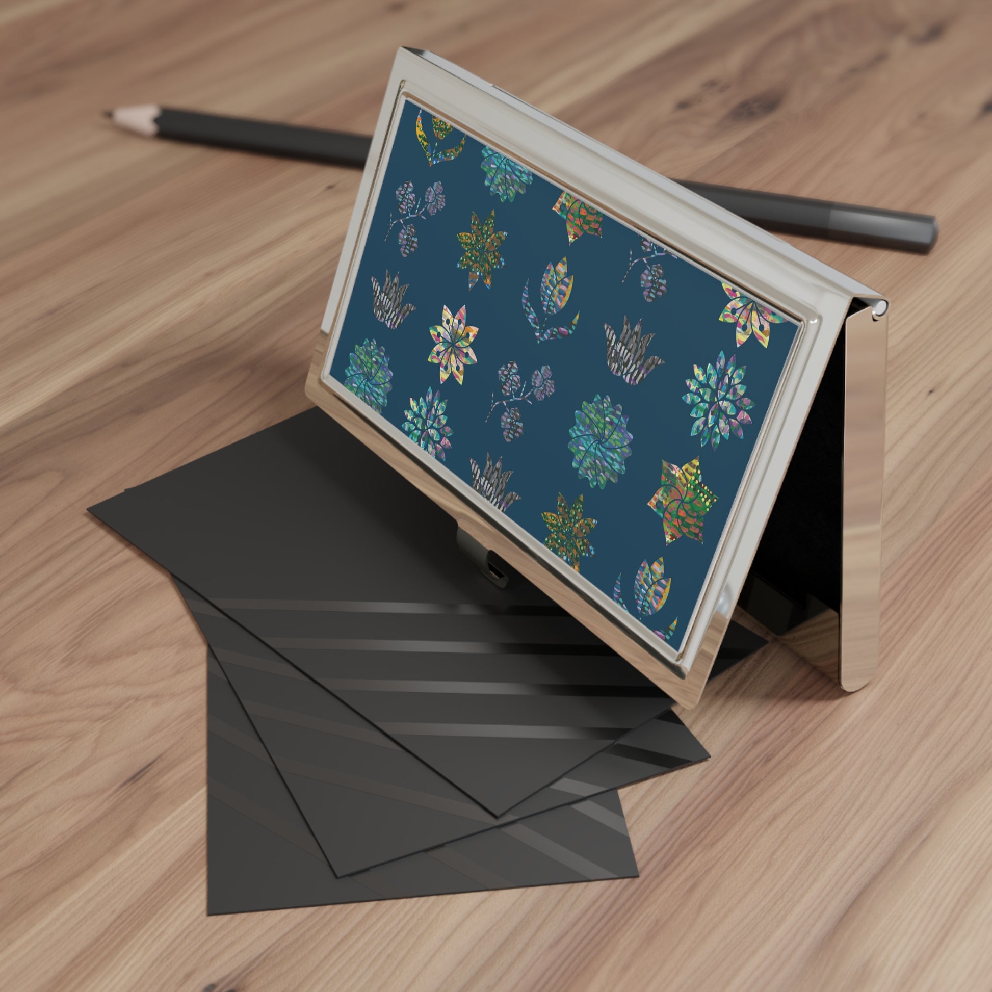 metal business card holder with an image of flowers