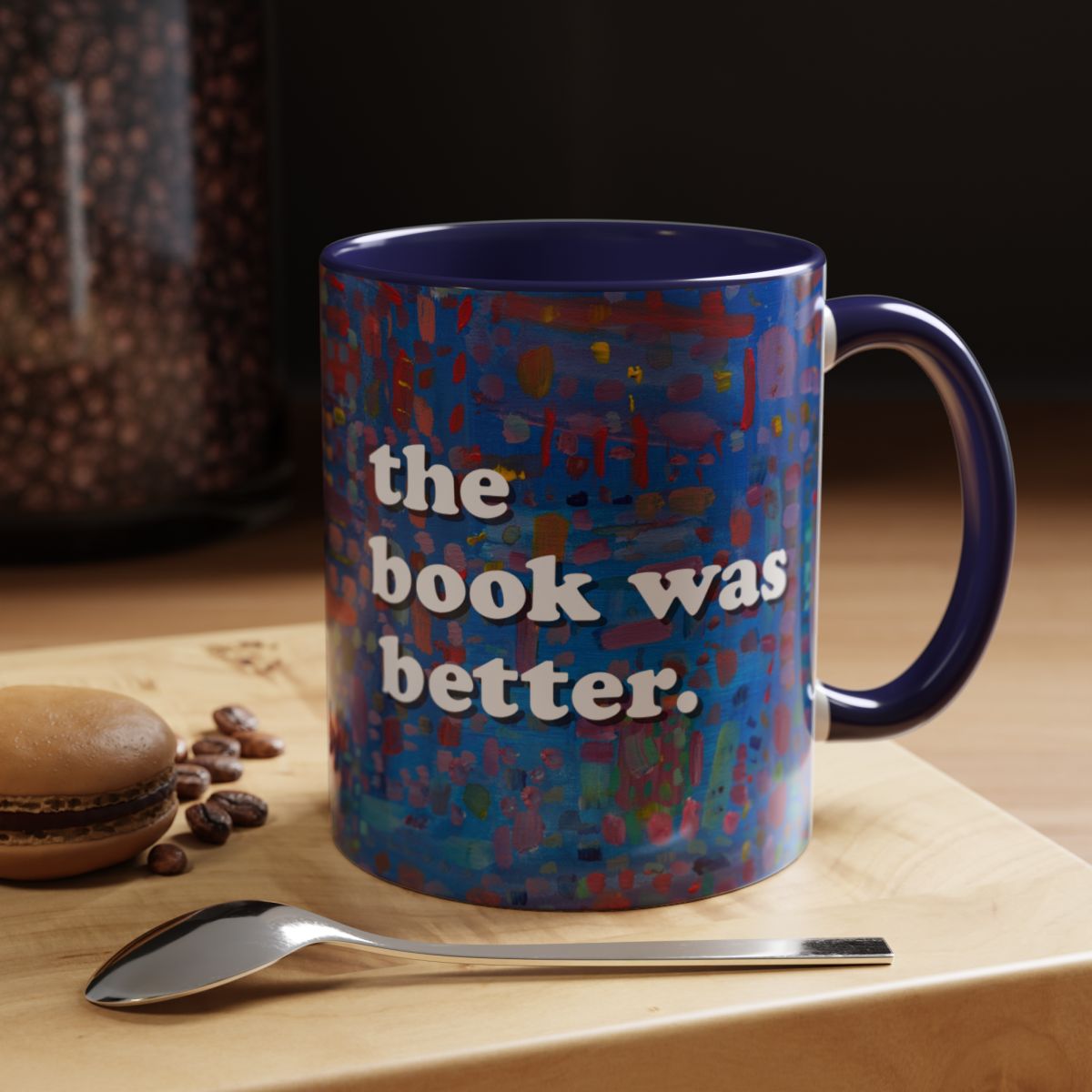 mug with blue and red pattern with saying the book was better on it