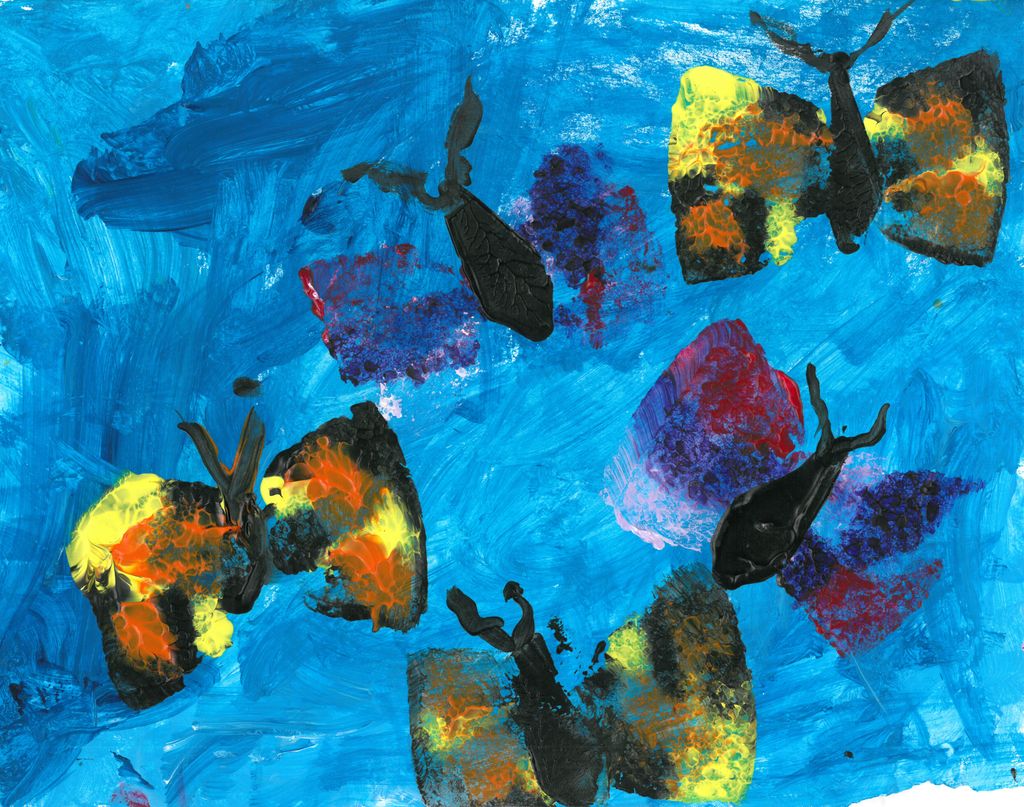 Painting of black butterflies with colorful wings of yellow and purple on a backgroung of light blue