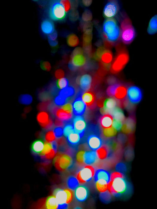 Black Photograph of multicolored lights glowing