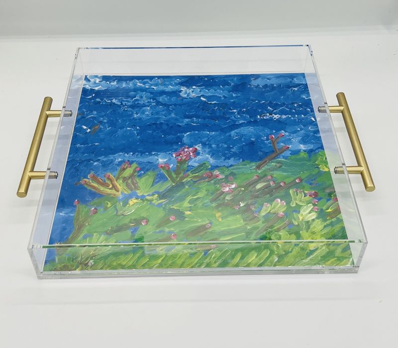 acrylic tray of an Acrylic painting of a green landscape with brown branches and red dots against a sky