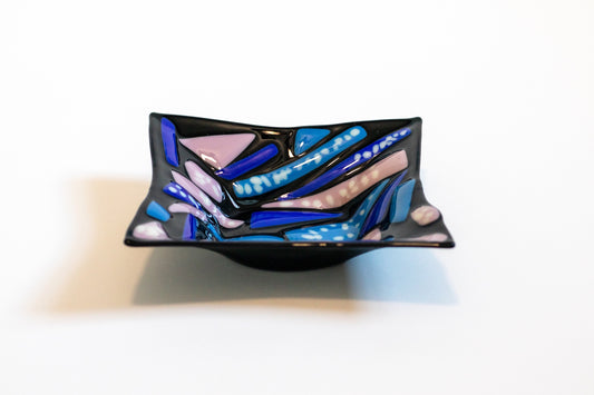 bowl with black background; lavender and blue colors added in the middle