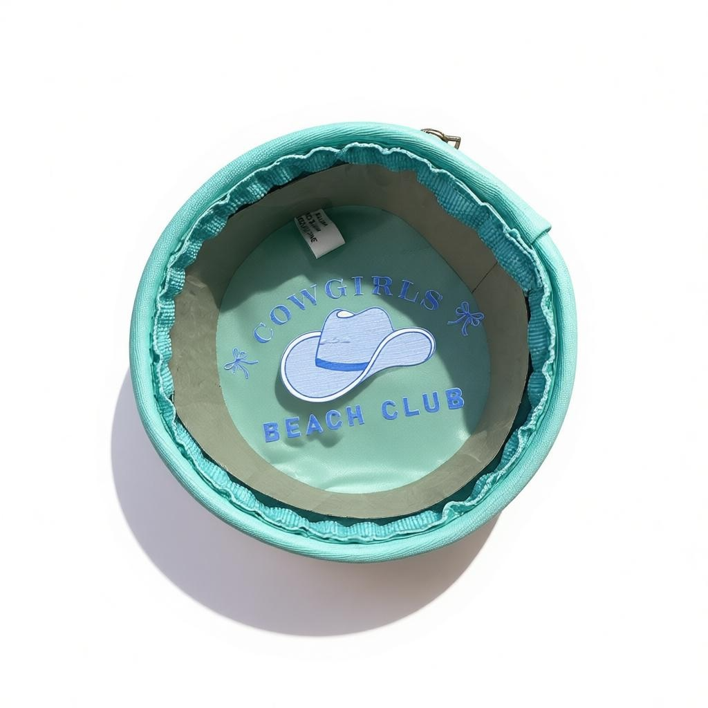 pouch that says cowgirls beach club