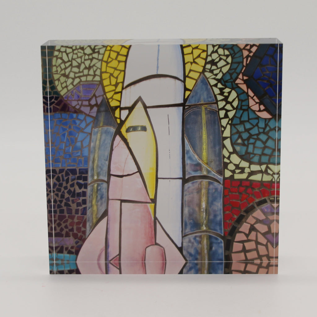 Acrylic block of colored mosaic tiles depicting space shuttle