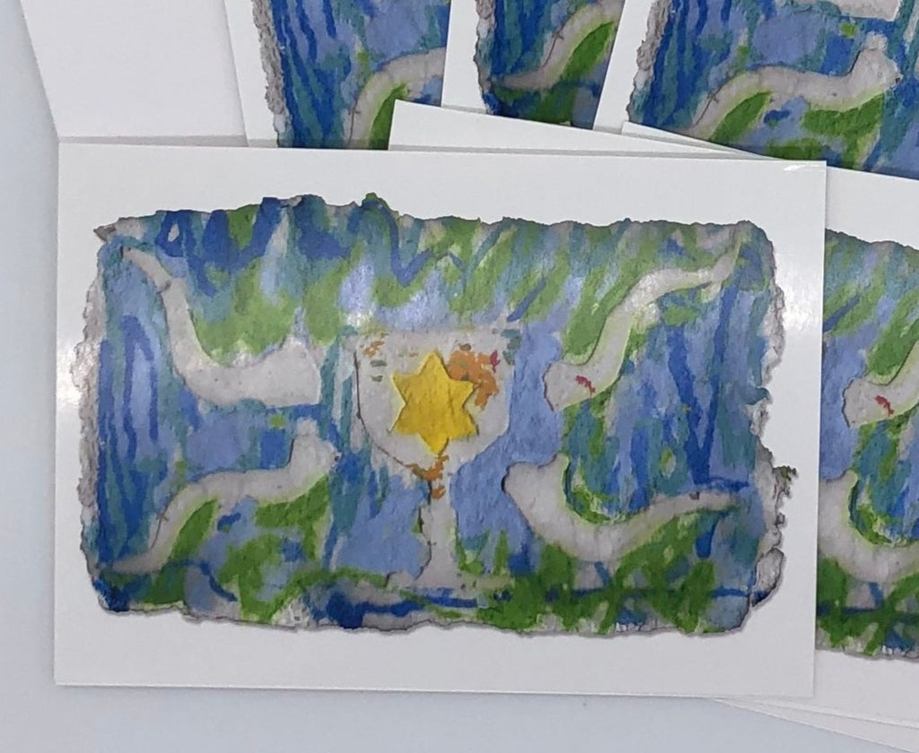 Graphic cards depicting original artwork with green, light blue and dark blue strokes with white shofars and a white Kiddush cup with a yellow Jewish star