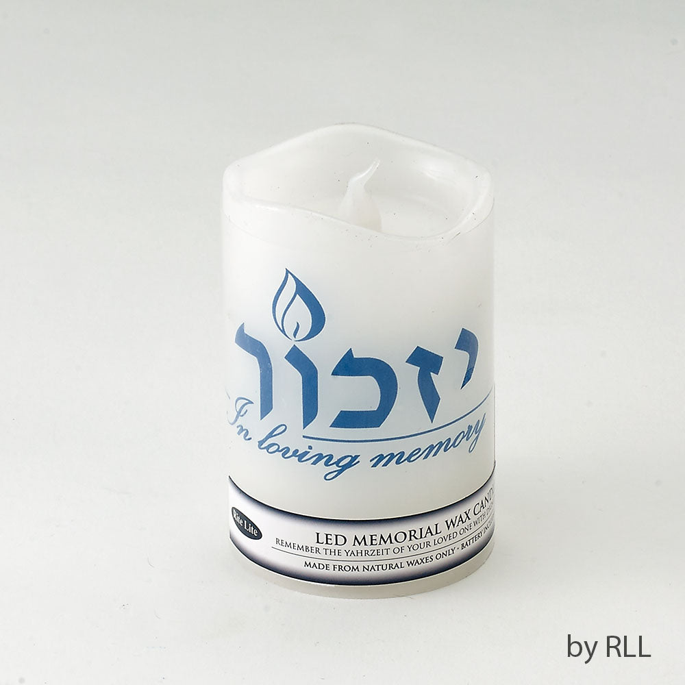 White LED Flameless Yizkor candle with blue Yizkor in Hebrew above In Loving Memory in English writing