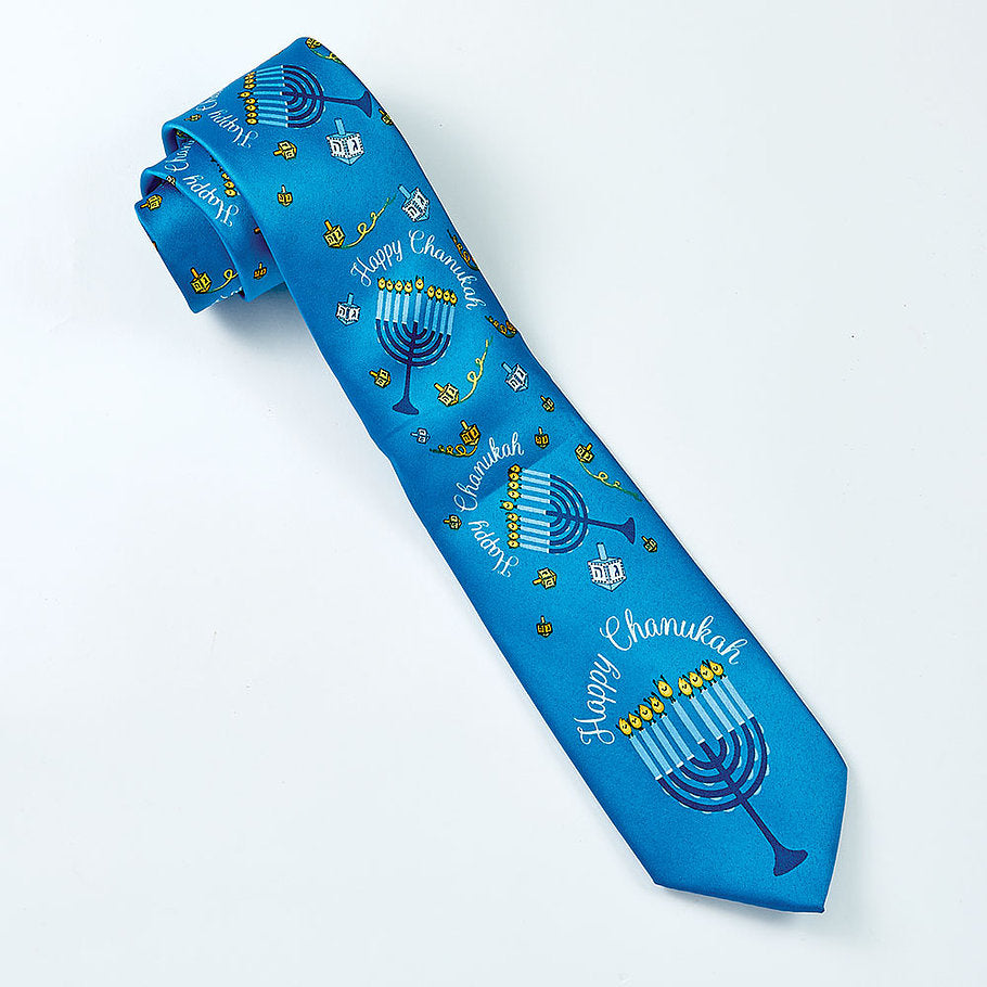 Light blue tie with white Happy Chanukah slogan, small yellow and white dreidels, and blue menorahs throughout