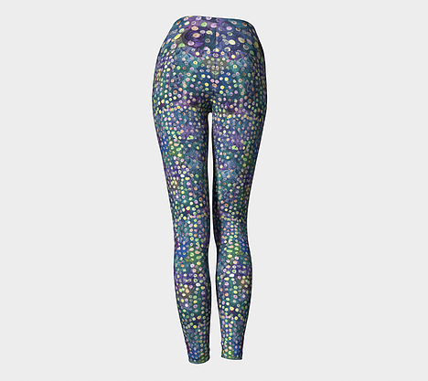 Yoga leggings with blue, green and purple swirl background with yellow, green and pink dots