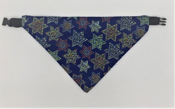 Dark blue dog bandana with yellow, red, and blue dotted Jewish stars