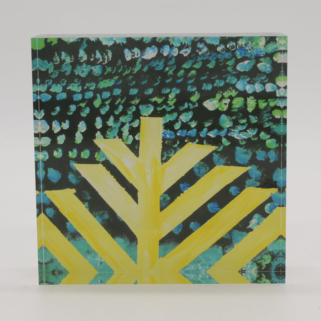 Acrylic block with black background, yellow menorah, and blue, turquoise and green dots