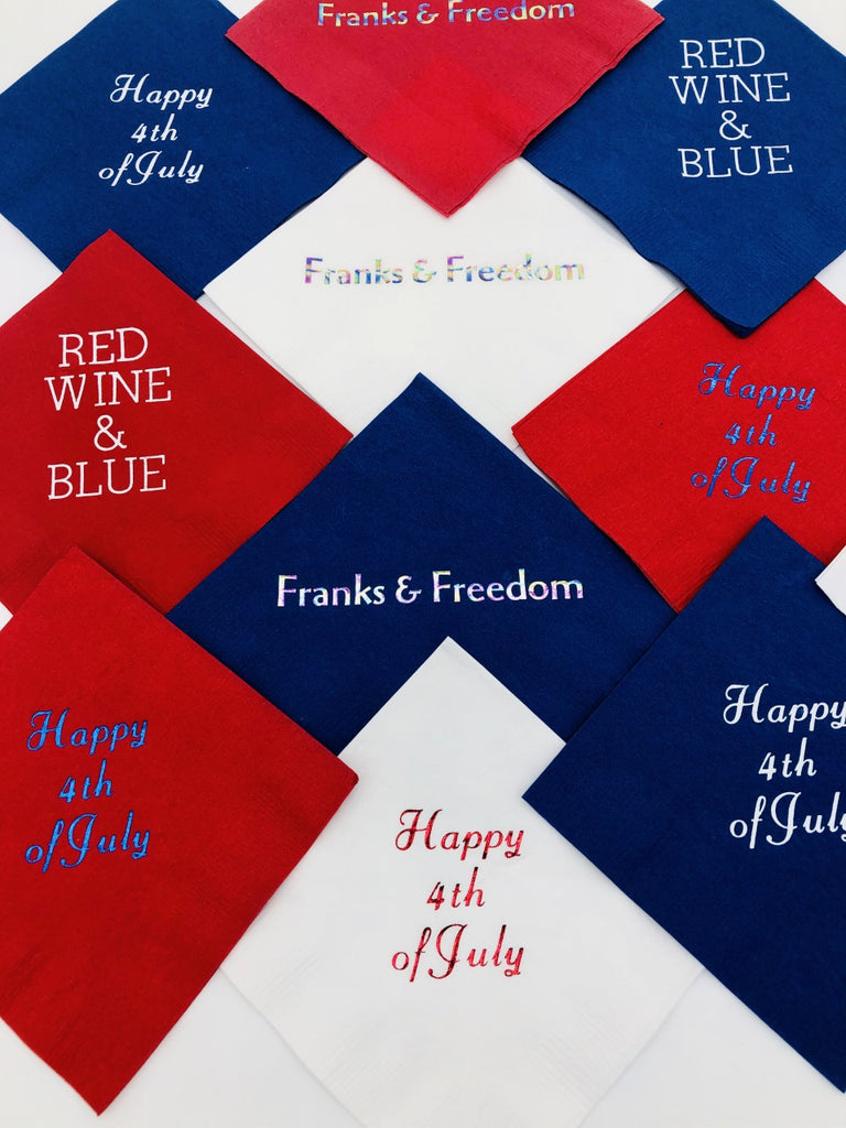 July 4th napkins showing various slogans including Happy 4th of July, Franks & Freedom and Red Wine & Blue in various red, white and blue variations