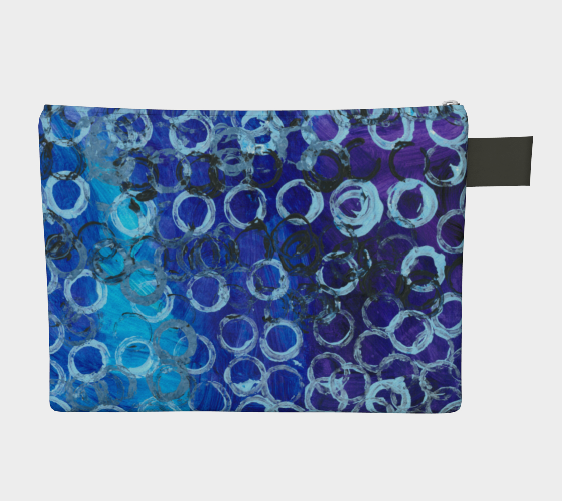 Zippered carryall bag depicting gradient blue background with white and black circles overlaid