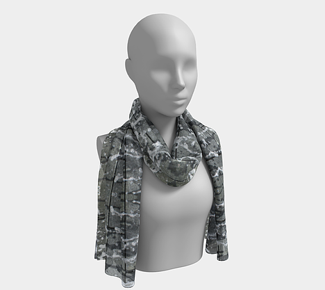 Mannequin wearing gray, white and black neck scarf with running water design