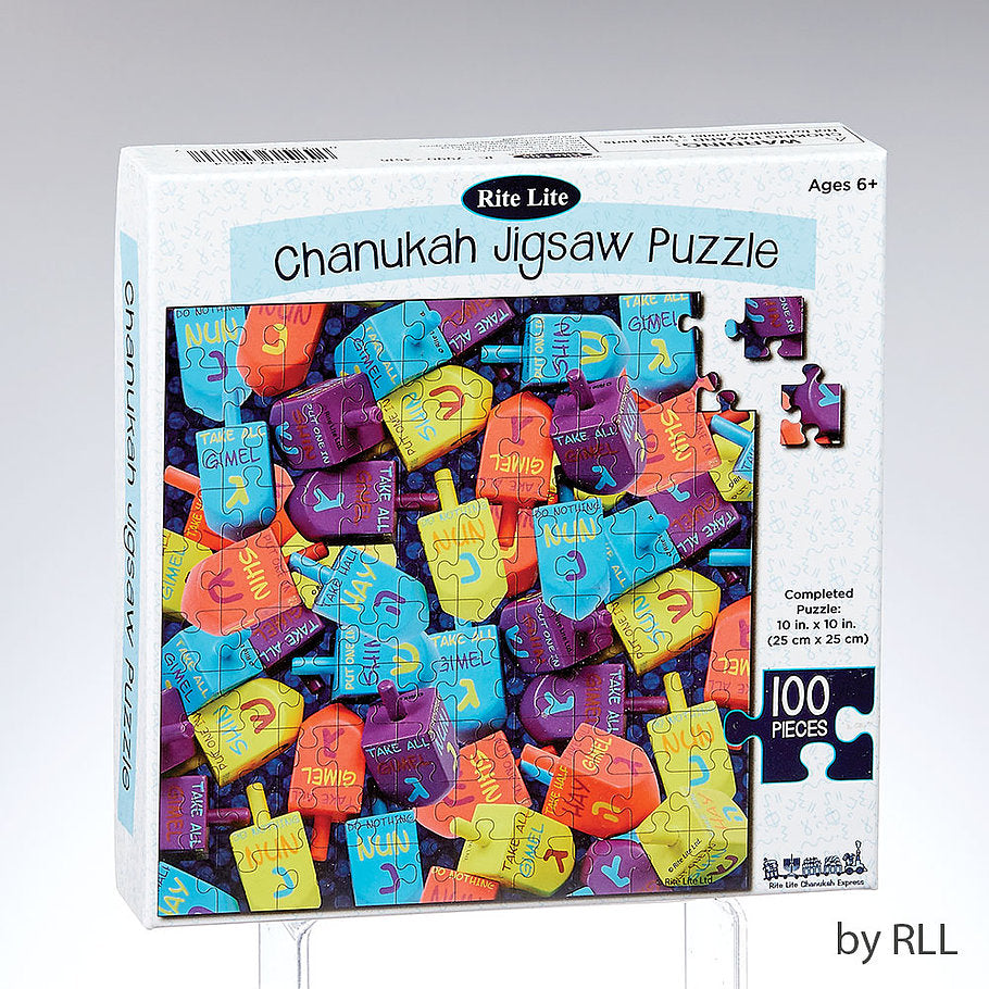 Chanukah jigsaw puzzle with light blue, orange, yellow and purple dreidels