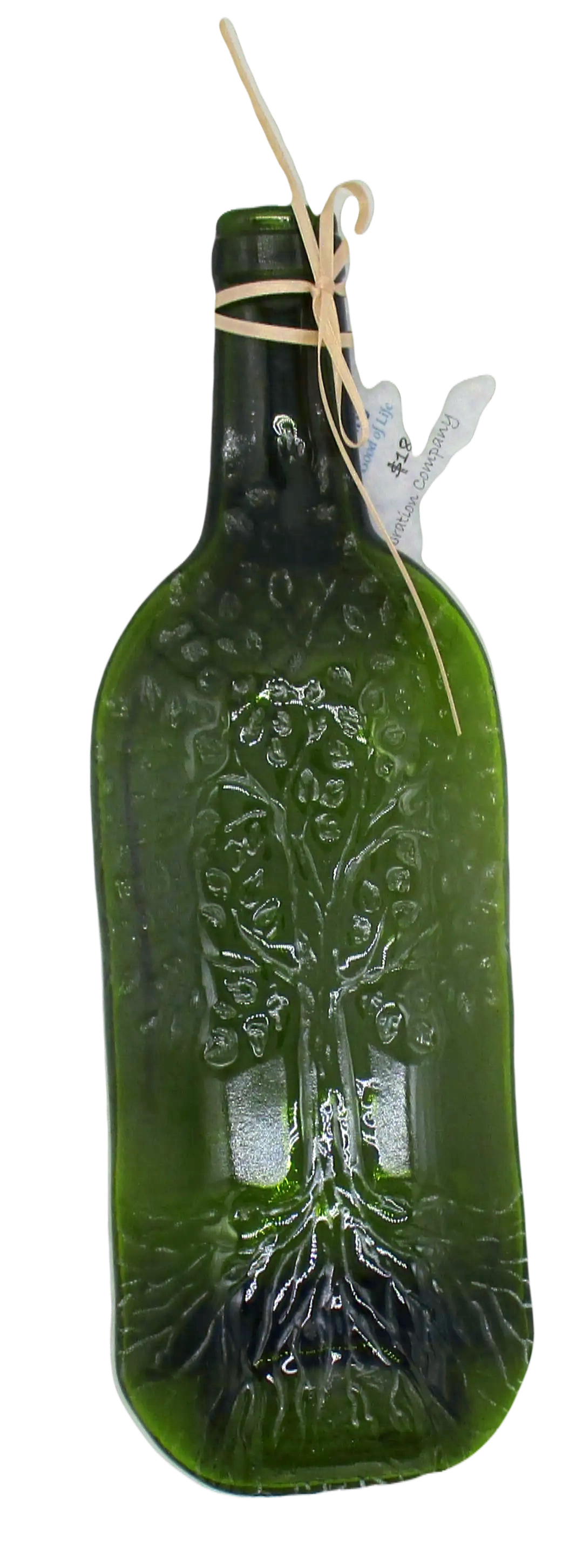 Green wine bottle that has been melted down and flattened with a Tree of Life stamped into it