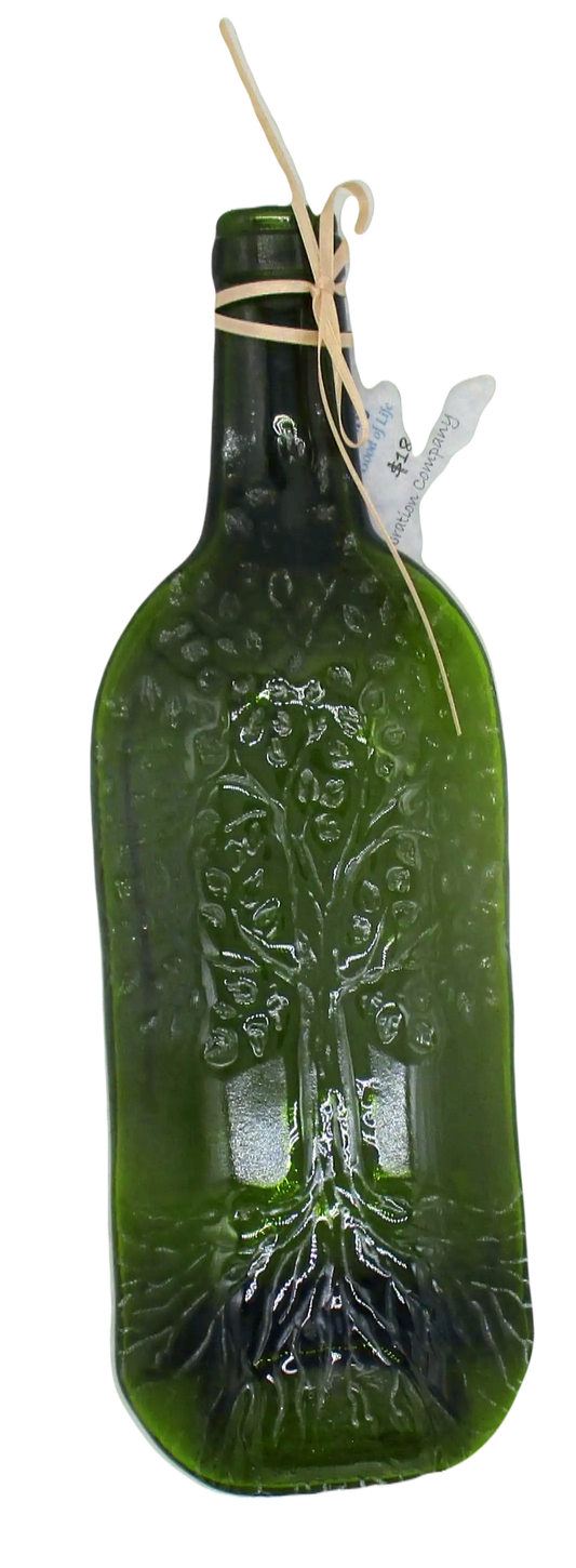 Green wine bottle that has been melted down and flattened with a Tree of Life stamped into it
