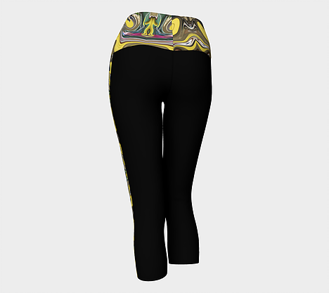 Back view of Black yoga capris with top band and side stripes depicting yellow, gold, green, pink swirl design