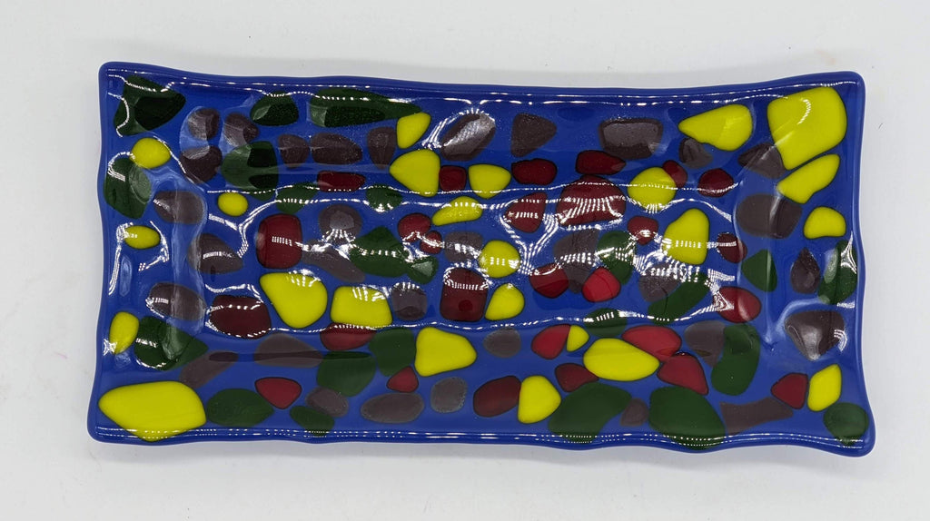 glass blue rectangular tray with yellow, red, and green dots all over