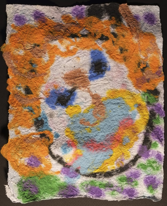 Pigment on recycled paper abstract artwork of a smiling face with orange hair