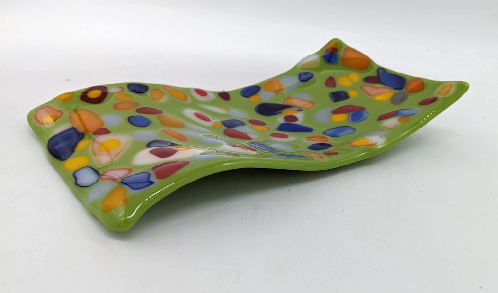 Green s curved spoon rest with spots of colors