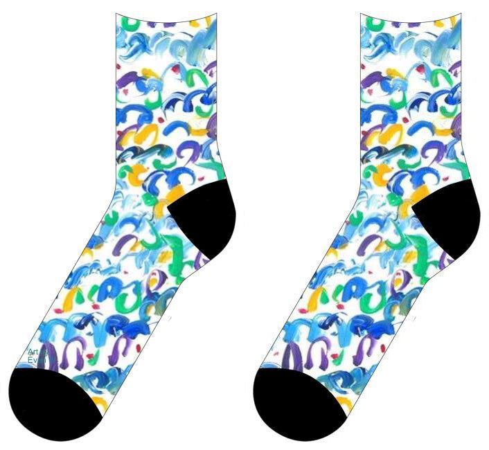 socks with blue, green, and yellow curli q's with red dots