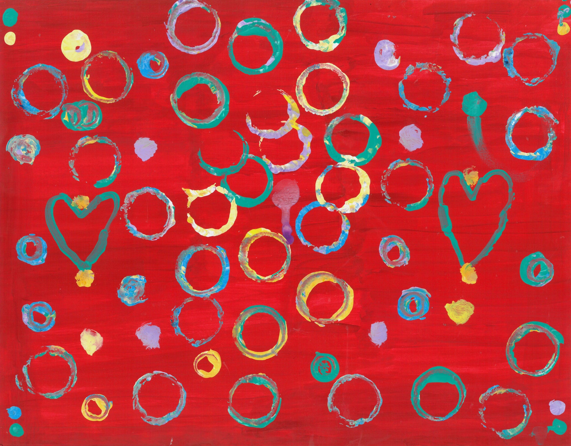 This is a painting with a red background. It has several blue, pink, and yellow circles and two green hearts