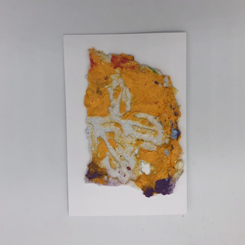 Handmade paper greeting card inspired by autumn with orange colored design.