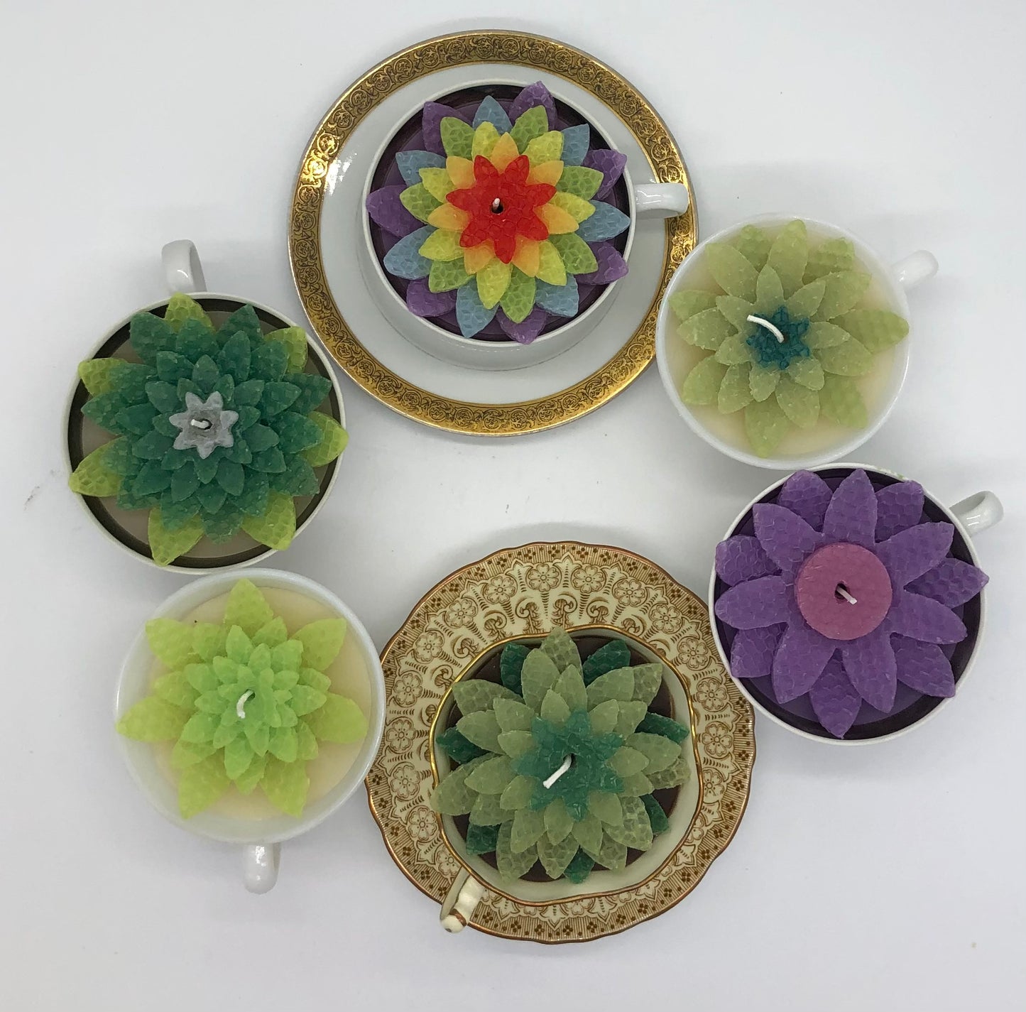 Top view of seven teacup candles.
