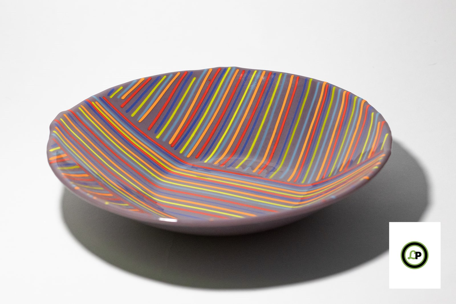 purple glass bowl with lines