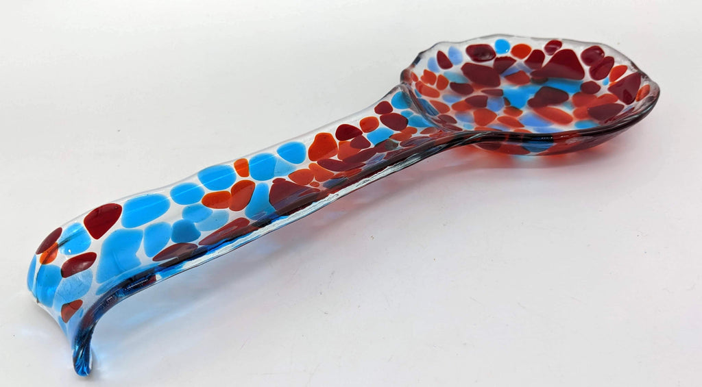blue and red spoon rest