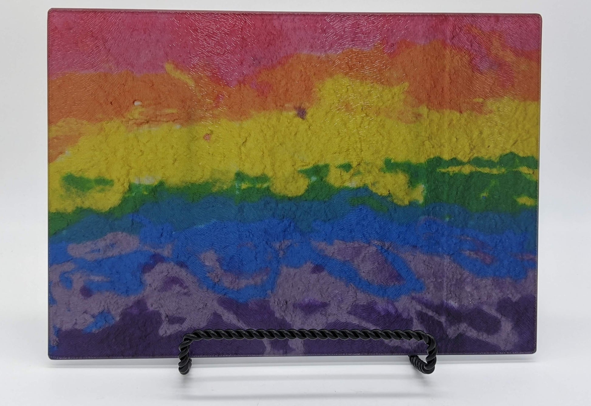 cutting board with the image of horizontal rainbow colors