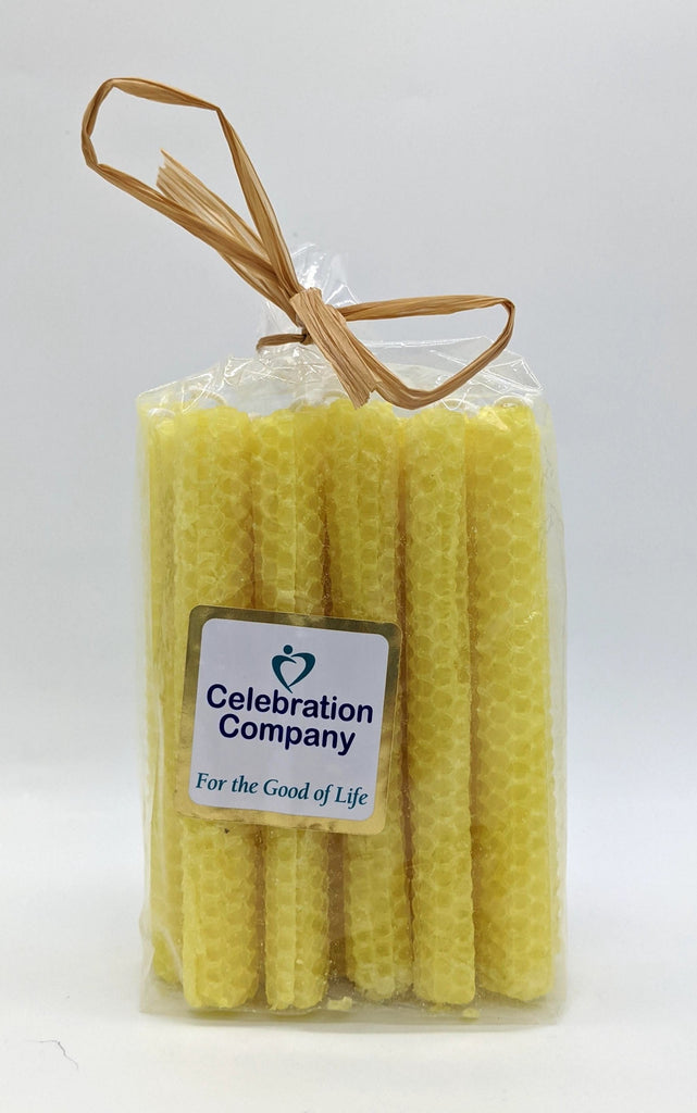 Package of 16 yellow Shabbat candles in clear package with top tied off.