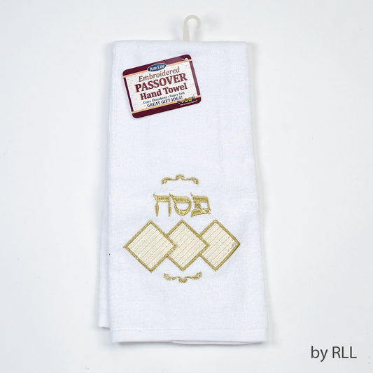 white dish towel with matzah and the Hebrew to Passover embroidered on it