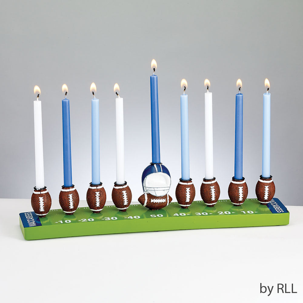 Football menorah with blue and white lit candles