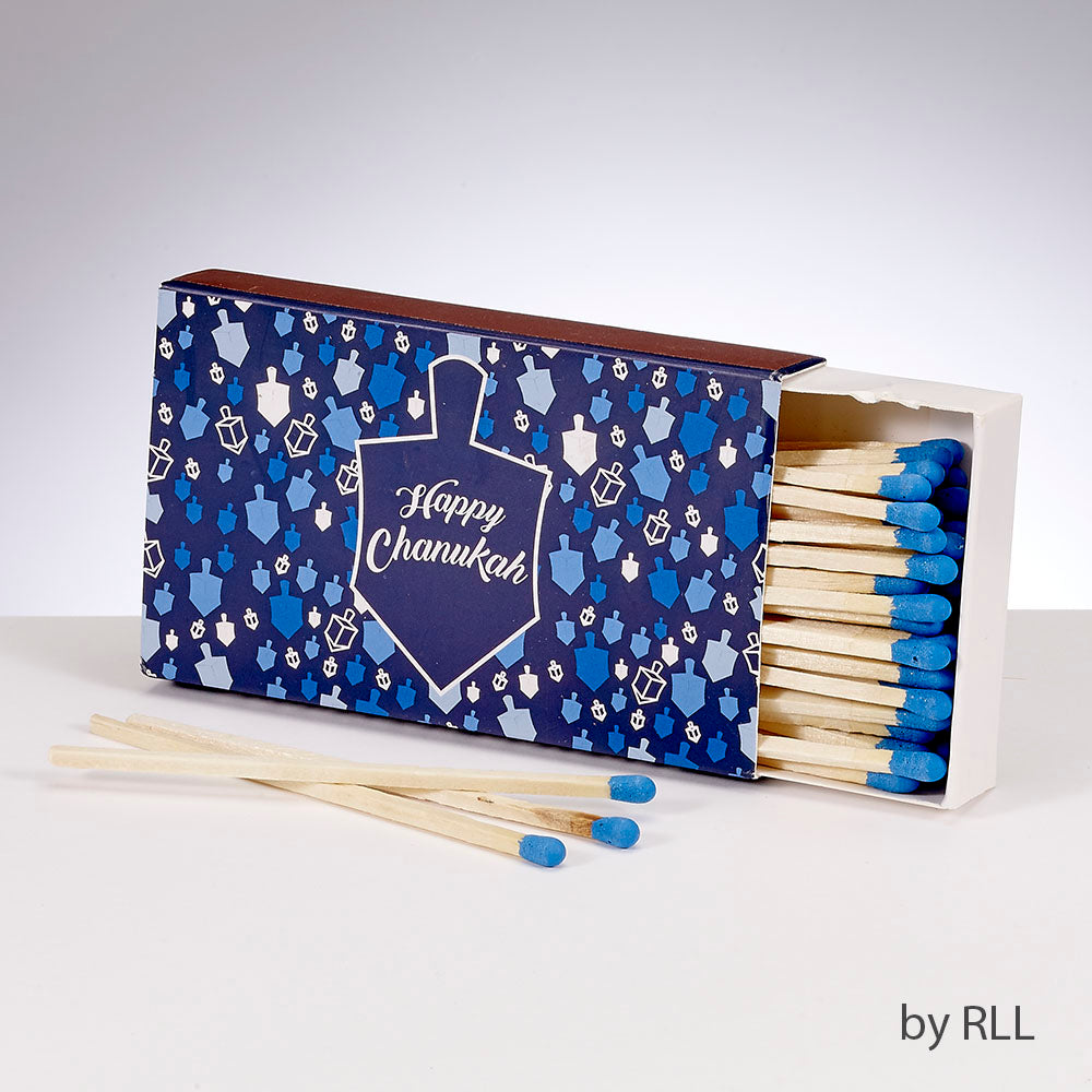 rectangular match box partially opened exposing wood matches with a blue tip