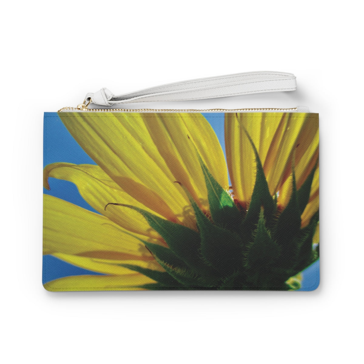clutch with photograph of yellow flower against sky